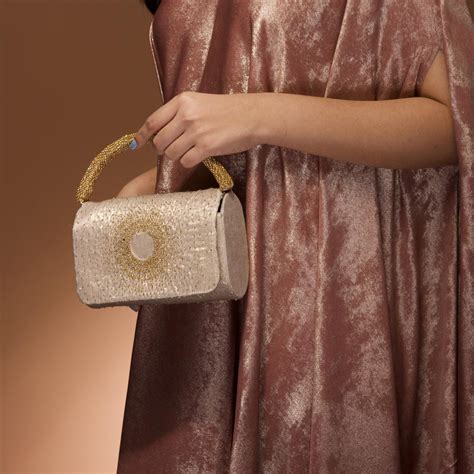 Gold shimmer flap bag starburst