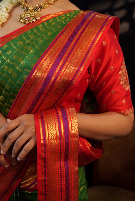 Green & Red Pure Kanjivaram Silk Saree with Rich Golden Zari Buttas