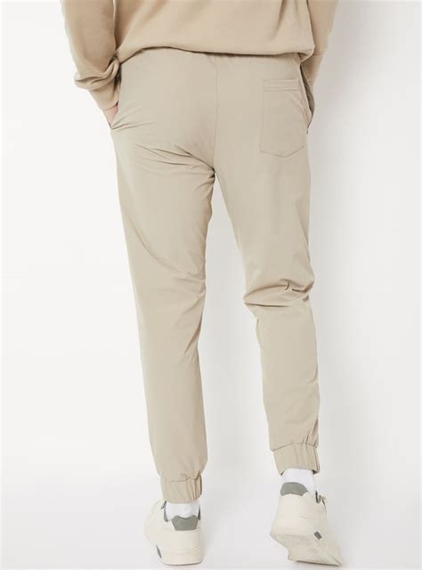 Buy Men Textured Slim Fit Sports Joggers Online at just Rs. 999.0 ...