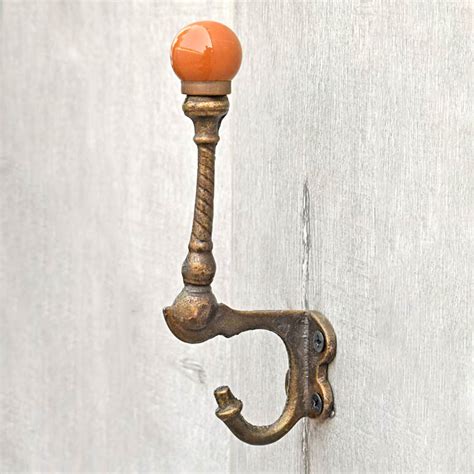 Seles Cast Iron Brown Ceramic Knob Coat Wall Hook – Spruce and Pop