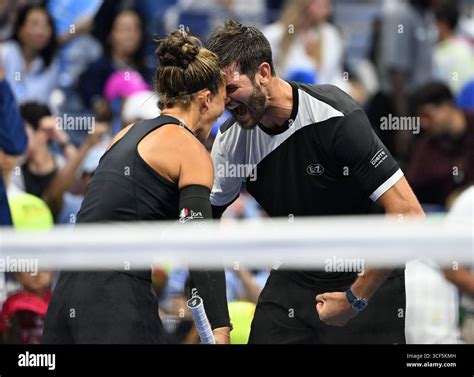 Sara Errani and Andrea Vavassori react after defeating Danielle Collins ...