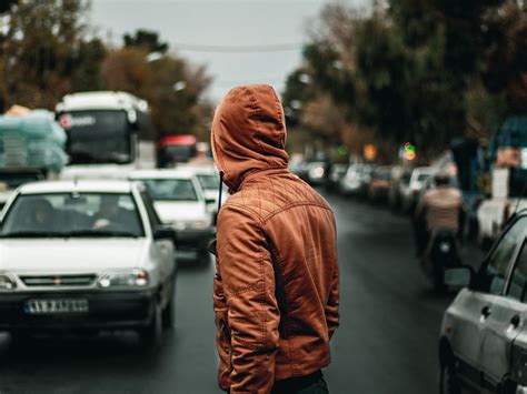 Download wallpaper 1600x1200 man, hood, road, street, cars standard 4:3 ...