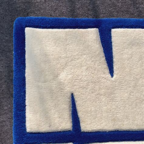 Nike Logo Minimal Hand-Tufted Rug | Ready to Ship – Carpet Diem