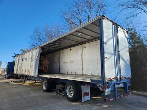 53 Ft. Curtain Side utility tractor trailer. Manufactured 10/2003 ...