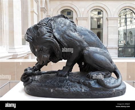 Lion with snake by Antoine Louis Barye, Louvre museum, Paris, France ...