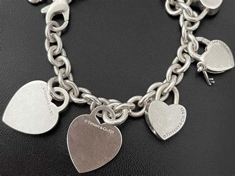 Tiffany and Co. 7 Heart Charm Bracelet Sterling Silver For Sale at ...