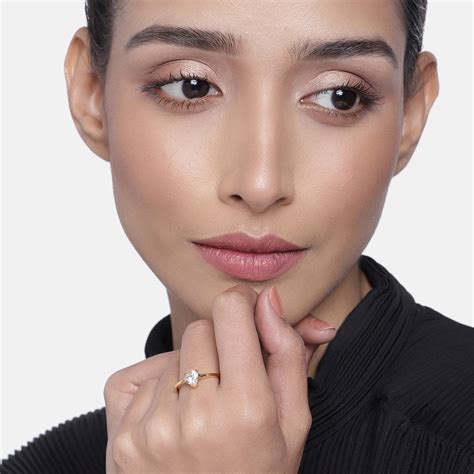 Simple gold plated ring with white stone – Estele