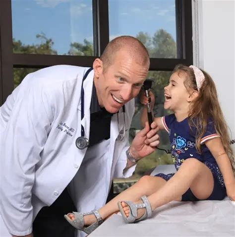 doctor with a little girl patient
