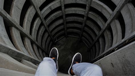 Download wallpaper 2560x1440 tunnel, legs, construction, well, depth ...