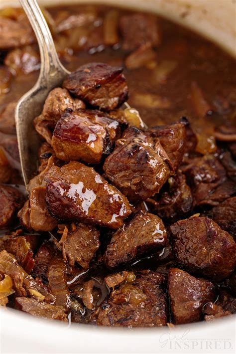 These juicy and tender crockpot steak bites prepared in a slow cooker ...
