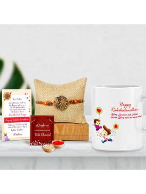 Buy eCraftIndia Designer Peacock Rakhi with Ceramic Tea & Coffee Mug ...