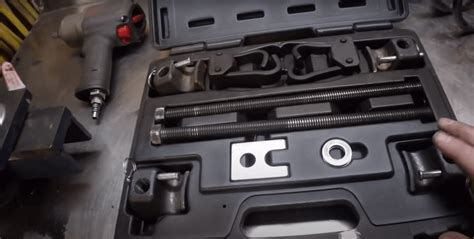 Image result for Using a Spring Compressor Tool