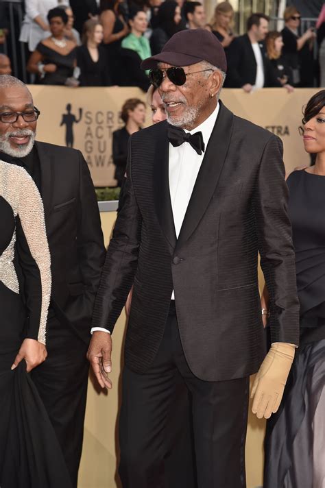 Why Does Morgan Freeman Wear a Glove? | POPSUGAR Celebrity
