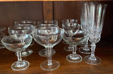 Lot - A Collection of Champagne Coupes & Glasses