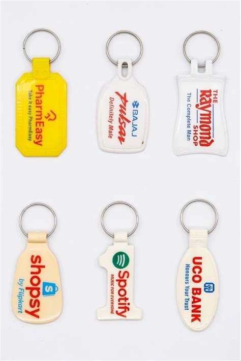 KEY CHAINS - Plastic Vinyl Sticker Keychain Trader - Wholesaler ...