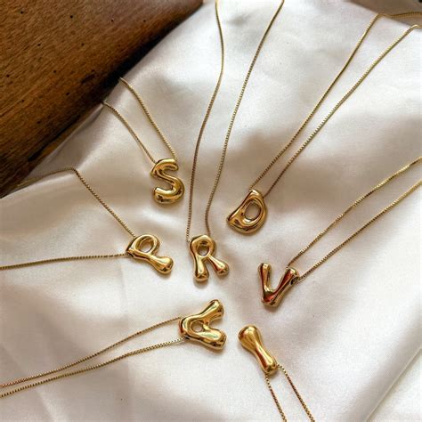 Dancing Bubble Alphabet Necklaces – A Little Extra