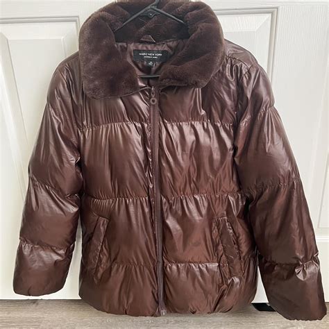 Brown puffer jackets. Really warm and nice for winter. - Depop