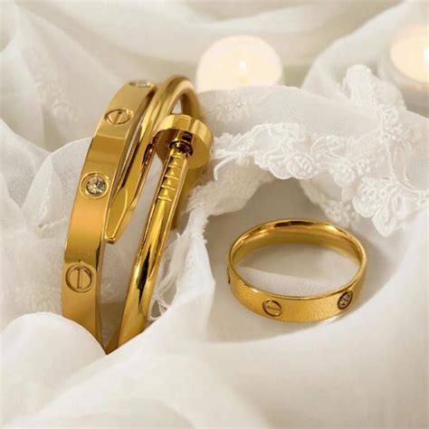 Stackable bangles with cartier ring – jewellerylovers
