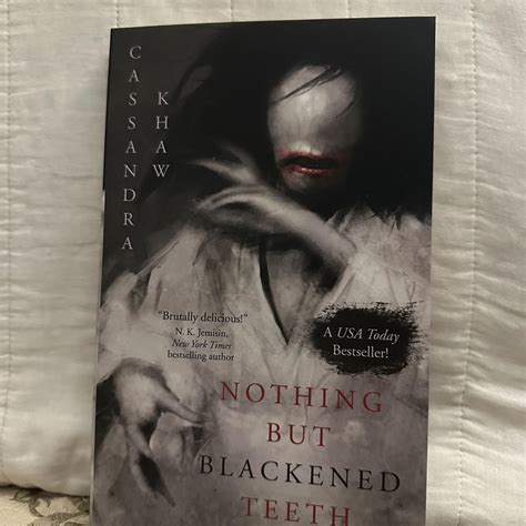 Nothing but Blackened Teeth by Cassandra Khaw... - Depop