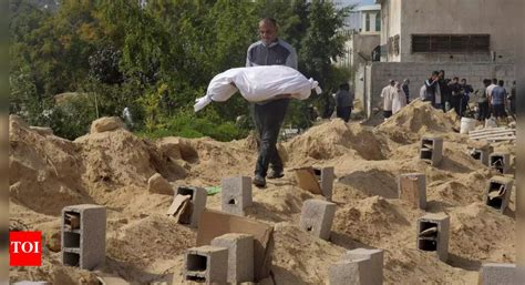 Burial In Mass Graves: Gaza families wear ID bracelets to avoid burial ...