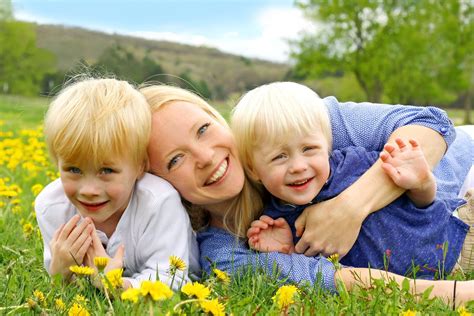 Happy Mother and Children Playing Outside | Faggio Financial