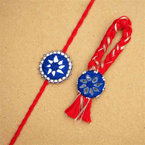 Buy Handmade Mirror Work Kajal Blue-Red Bhaiya Bhabhi Rakhi With Roli ...