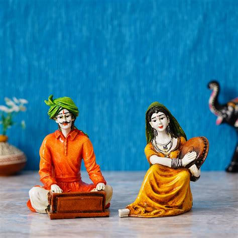 Colorful Combo of Rajasthani Craftsmen and Lady Playing a Musical Inst ...