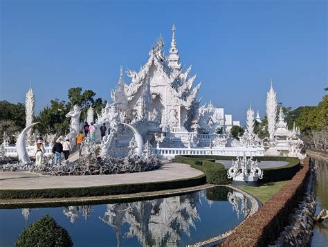 Free picture: Majestic exterior of the Wat Rong Khun or the White Temple with beautiful garden ...