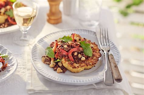 Roast cauliflower steaks with puy lentil, goat’s cheese and pepper ...