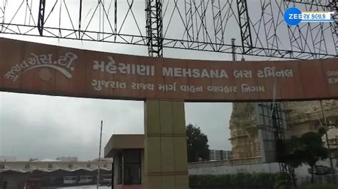 Watch Breaking News Rain water filled the bus stand of Mehsana | ZEE5 ...