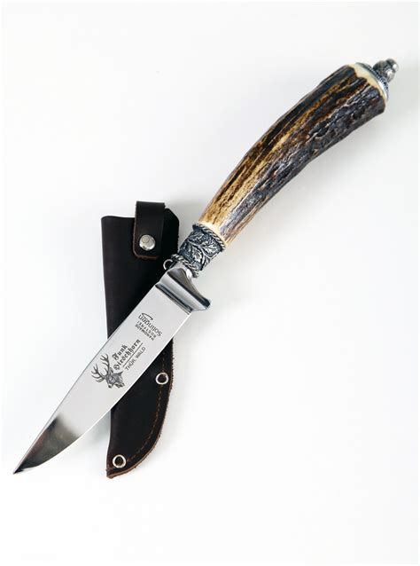 Traditional deer horn knife with snuffbox