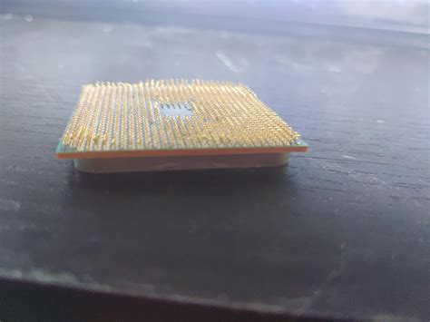 Someone's kid got ahold of one of their CPUs, and the picture says it ...