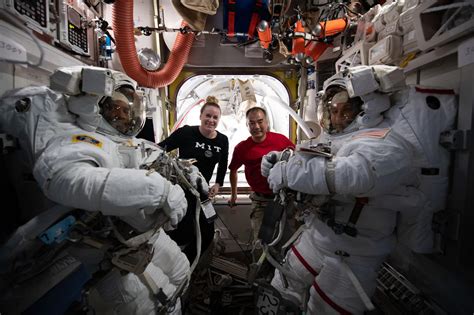 https://scitechdaily.com/images/Team-Portrait-During-Spacewalk-Preparations-2048x1365.jpg