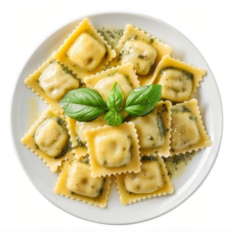 A plate of spinach and cheese stuffed ravioli isolated on white ...