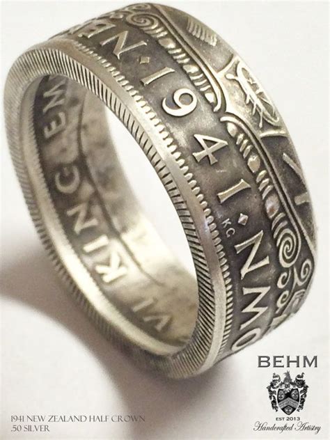 a silver coin ring with the words alaska on it