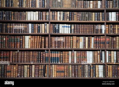 "Wren Library Cambridge" Rows of old books on book shelf, "The Stock ...
