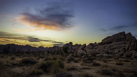 Download wallpaper 3840x2160 prairie, rocks, trees, bushes, sunset 4k ...