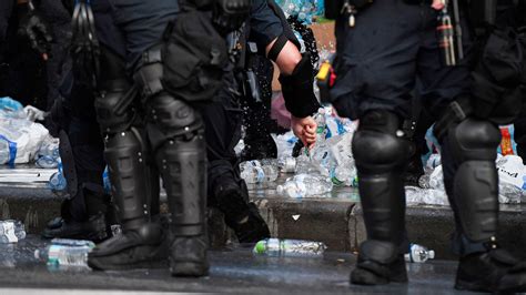 Asheville, North Carolina, police seen destroying protesters' supplies
