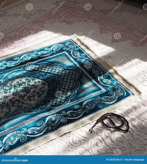 Prayer Rug for Praying in Islam, Prayer Rug and Rosary Laid Under ...