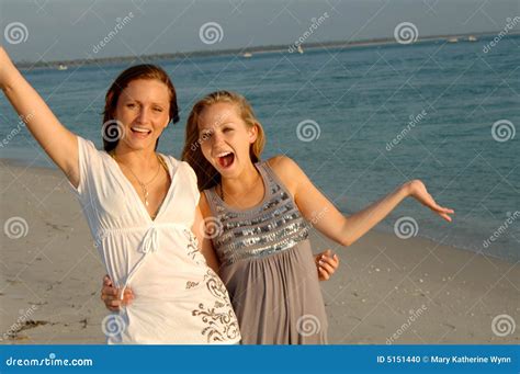 Teens having fun at beach stock photo. Image of shore - 5151440