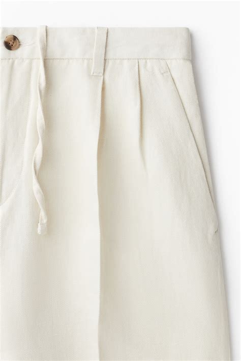 Loose Fit Linen-blend trousers - White - Men | H&M IN