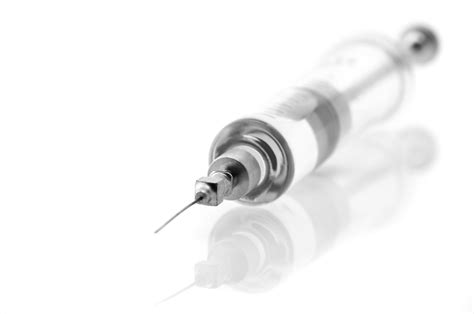 Stock photo 67486132 - Glass syringe isolated on white background ...