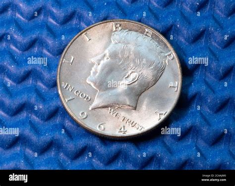 Still life of a United States historical fifty cent piece with ...