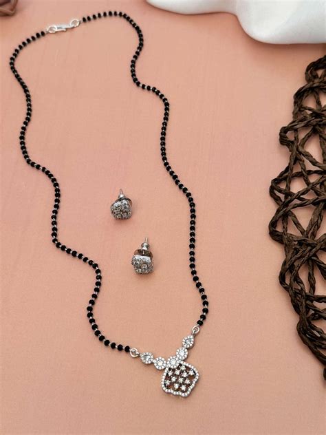 Solitaire American Diamond Mangalsutra Set with black beads and ...