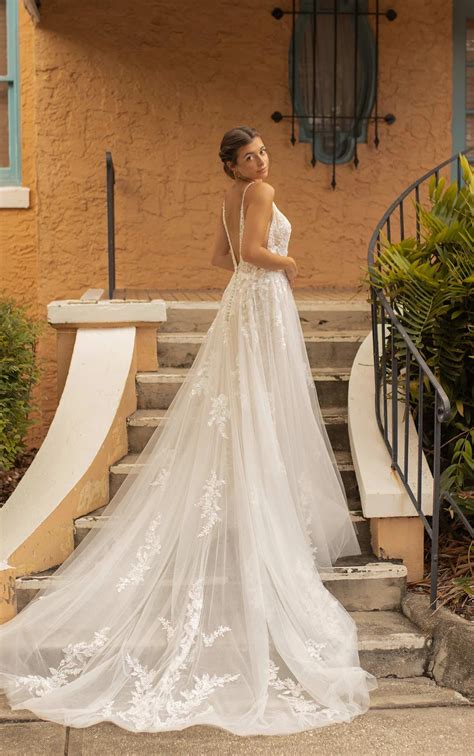 Dreamy Spaghetti Strap Lace Wedding Dress with Plunging Neckline