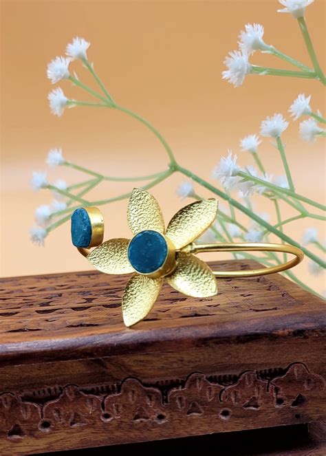 Stylish Brass Floral Steel blue Stone Studded Bracelet – zazyco