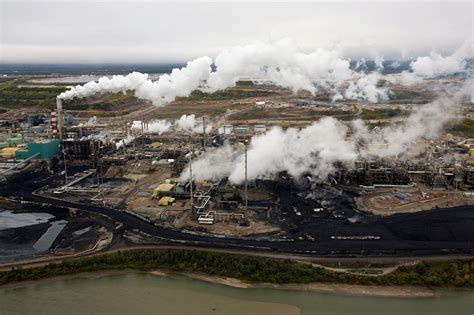 EXCLUSIVE Alberta to toughen oil sands emissions standards that reward big Canadian polluters ...