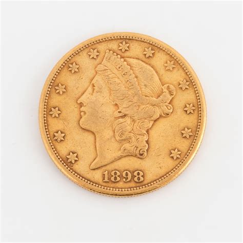 A 1898 20-dollar gold coin. - Bukowskis