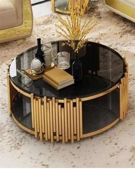 ELLIPTICAL GLASS ANODIZE CENTER TABLE – SUREKH DECOR