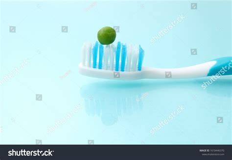 9 Pea Sized Amount Toothpaste Royalty-Free Images, Stock Photos ...